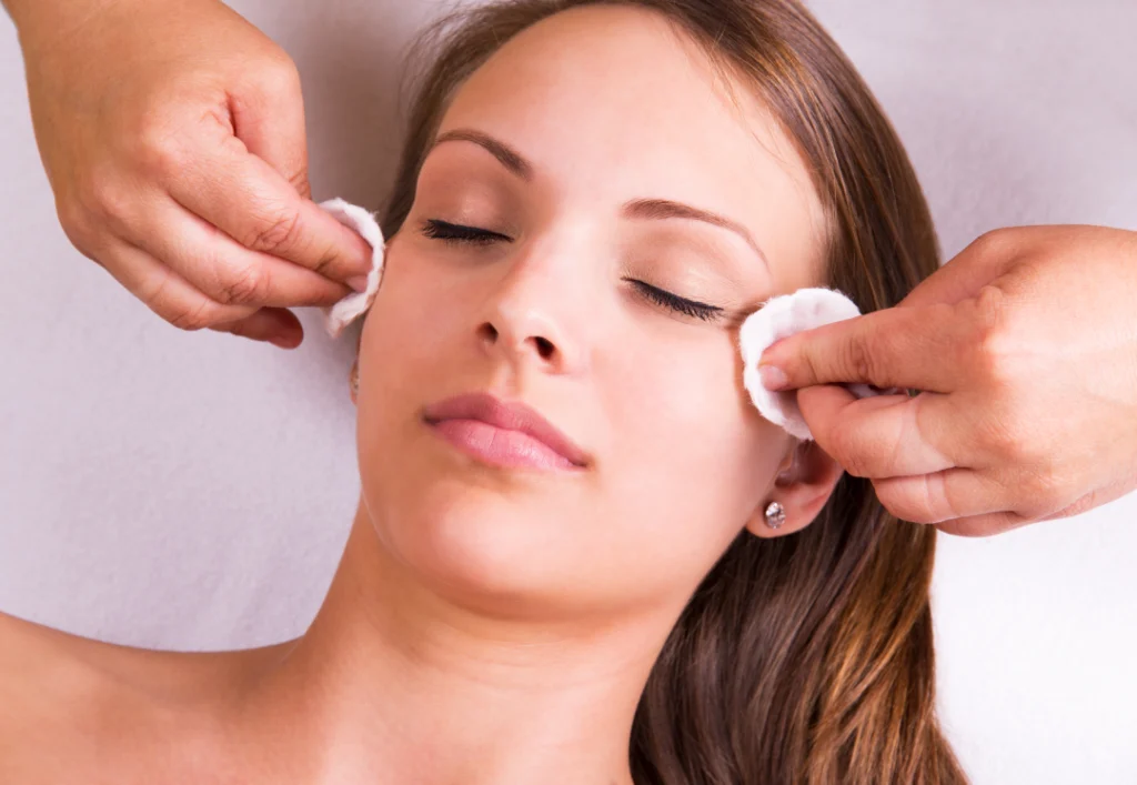 A cleansing process being prepared for a chemical peel treatment.