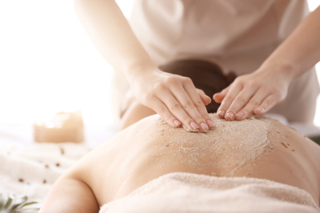 A body peel treatment being applied to exfoliate and rejuvenate skin through chemical peels.